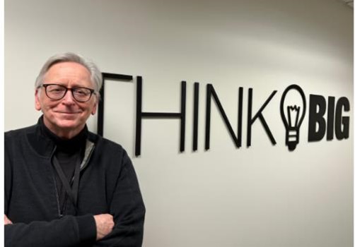 Andrew Drozd, Ph.D., is president of Andro, a tech company in Rome. He stands in front of a sign at the company. Drozd also is founder and chair of the Project Fibonacci Foundation to promote STEAM education. (Marie Morelli | mmorelli@syracuse.com)Marie Morelli | mmorelli@syracuse.com